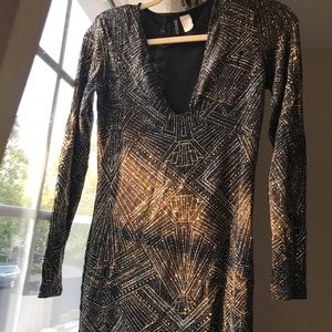 Sparkly deep v cut dress